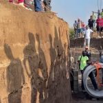Haitianos colocan tuberías para reencauzar el río Masacre